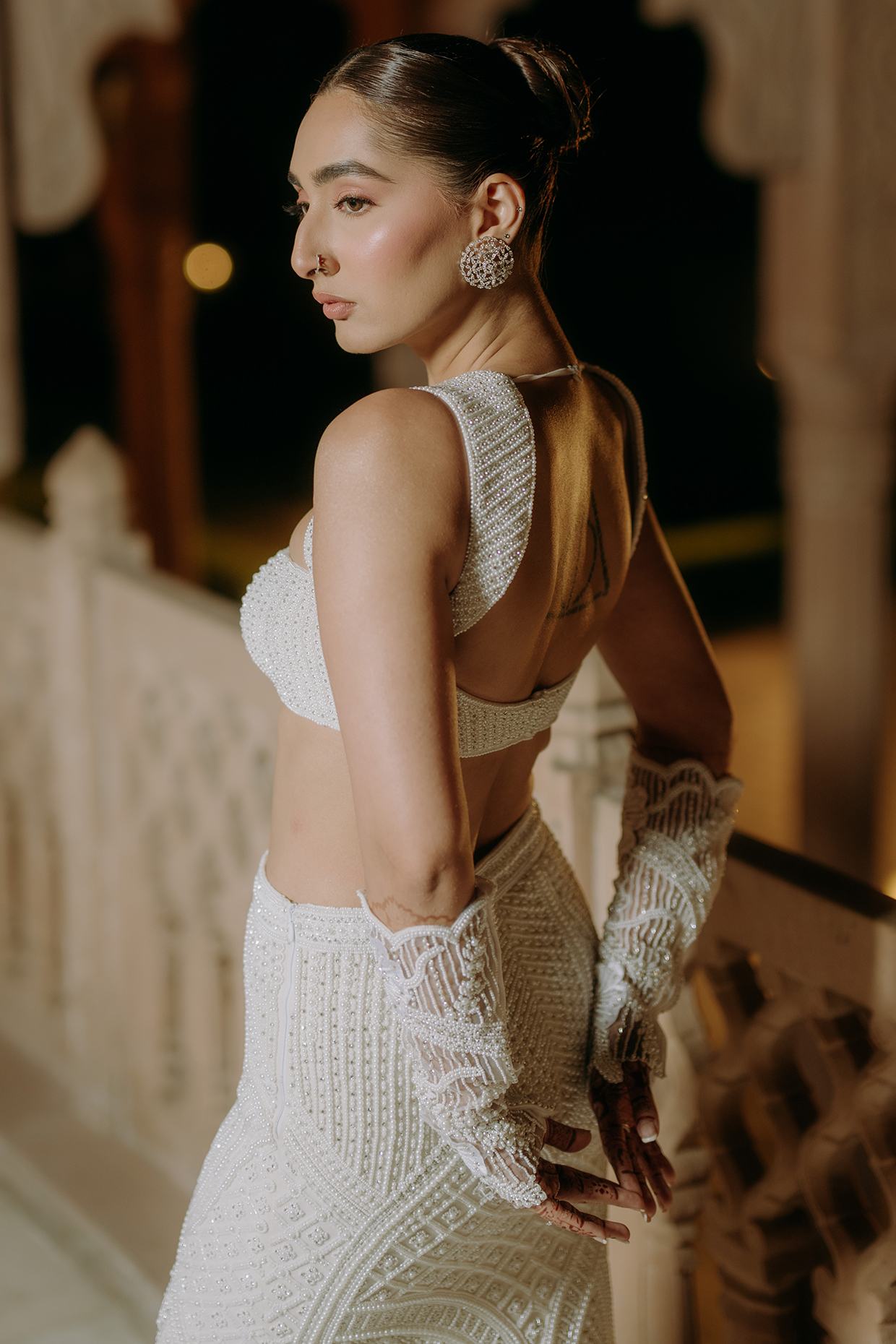 White Georgette Pearl Embellished Slit Skirt Set by Anjanaa