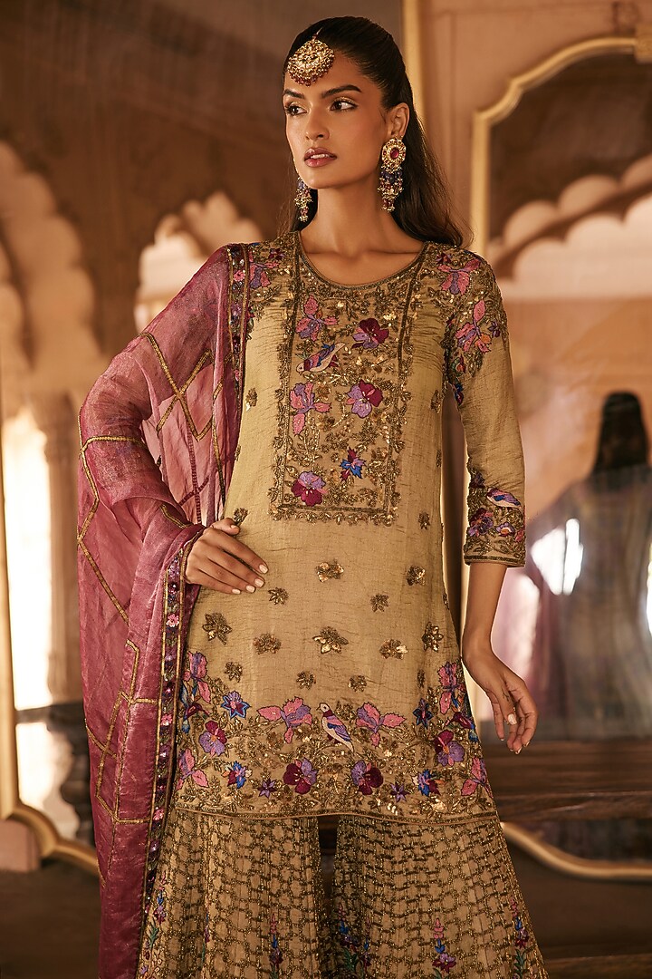 Gold Silk Tissue Dabka & Nakshi Hand Embroidered Gharara Set by Anjanaa M Dang at Pernia's Pop Up Shop