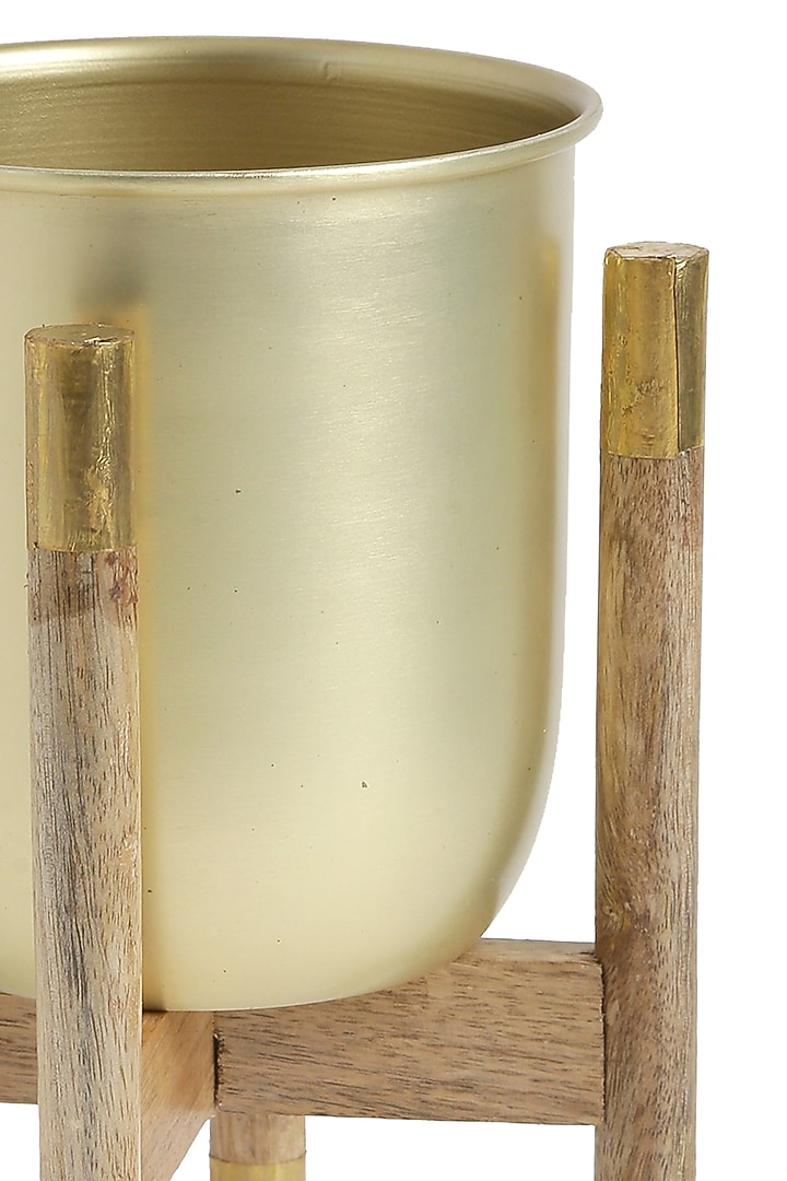 Matt Gold Planter With Wooden Stand by Amoliconcepts at Pernia's Pop Up Shop
