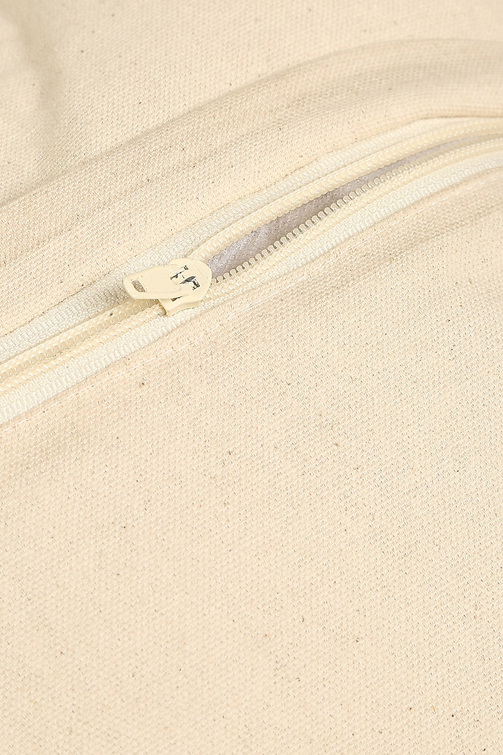 Off-White Cotton Cushion Cover With Tassels by Amoliconcepts at Pernia's Pop Up Shop