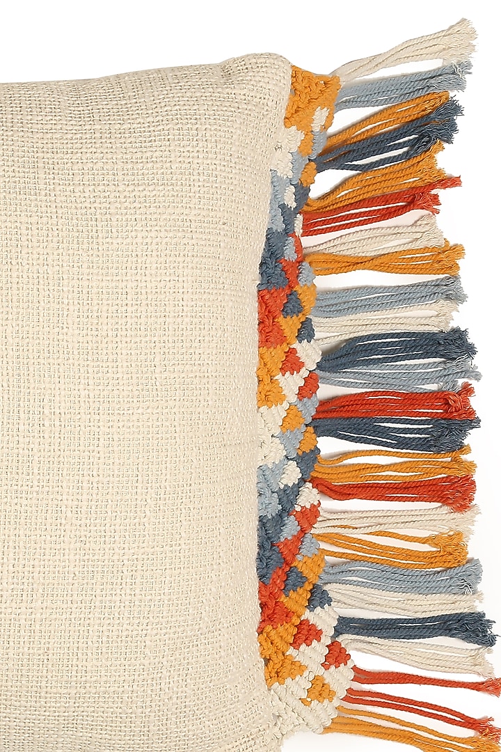 Off-White Cotton Cushion Cover With Tassels by Amoliconcepts at Pernia's Pop Up Shop