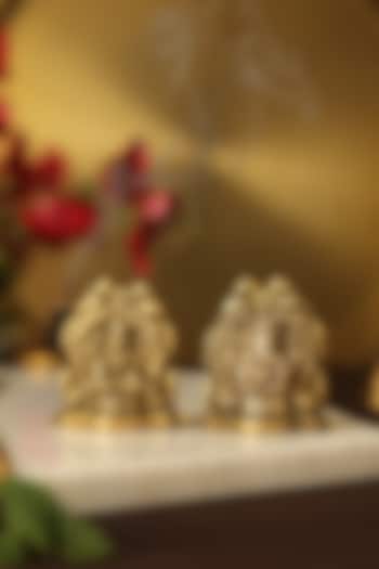 Antique Gold Laxmi & Ganesha Idols With Peacock Detailing (Set of 2) by Amoliconcepts at Pernia's Pop Up Shop