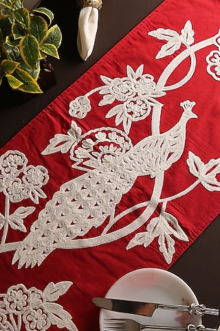 Red & White Embroidered Runner With A Peacock Design by Amoliconcepts