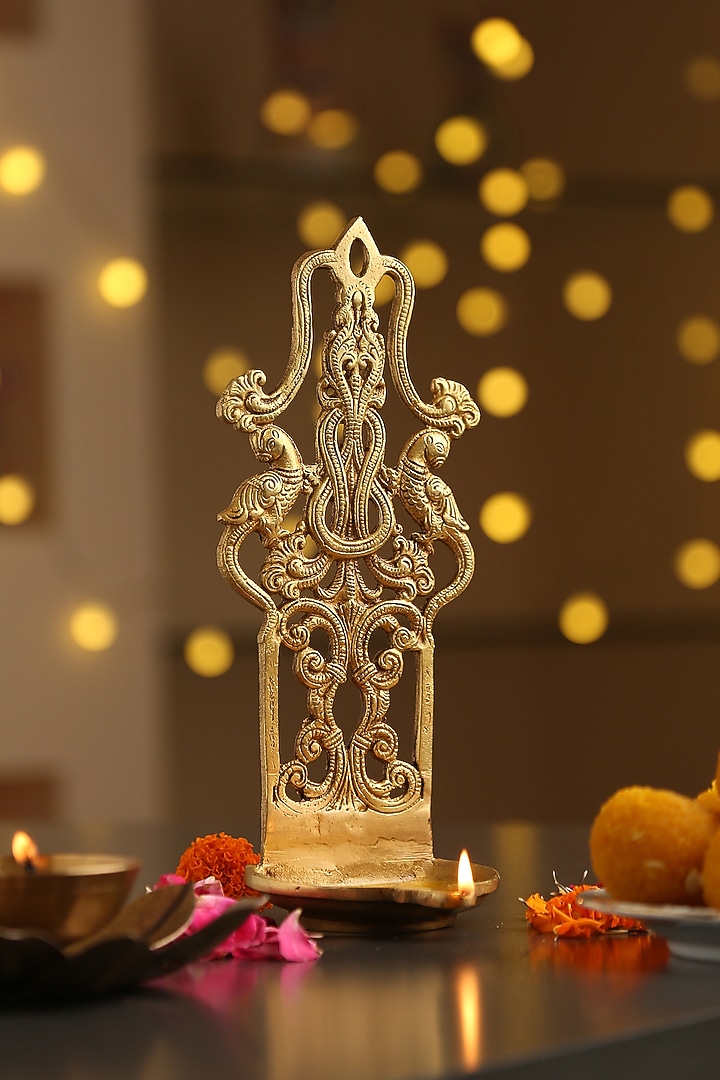 Antique Gold Brass Wall Diya by Amoliconcepts at Pernia's Pop Up Shop