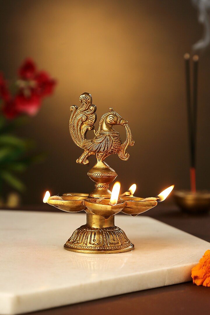 Antique Gold Peacock Brass Lamp With Diyas by Amoliconcepts at Pernia's Pop Up Shop