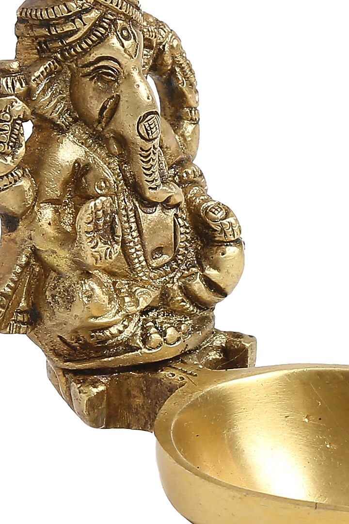 Antique Gold Brass Ganesha Diya by Amoliconcepts at Pernia's Pop Up Shop