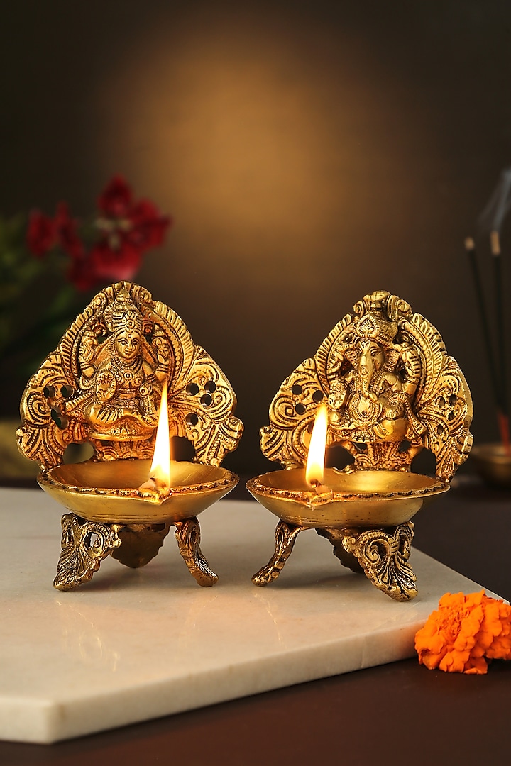 Antique Gold Brass Ganesha & Laxmi Diyas (Set of 2) by Amoliconcepts