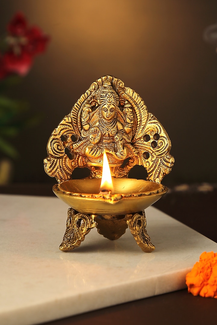 Antique Gold Brass Ganesha & Laxmi Diyas (Set of 2) by Amoliconcepts at Pernia's Pop Up Shop