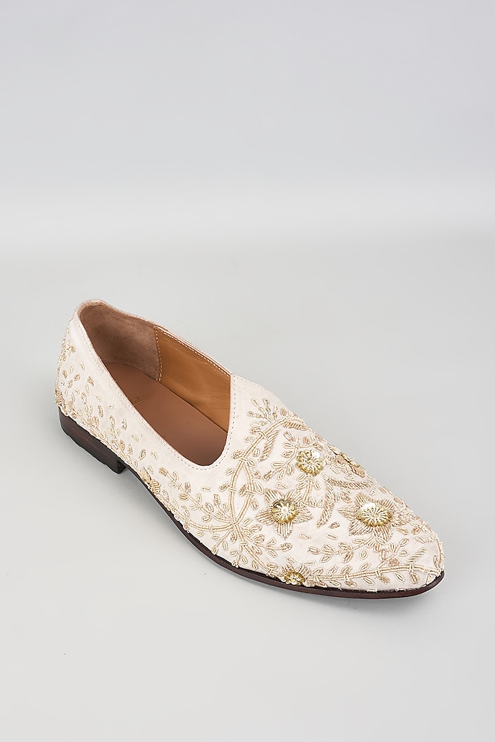 White Raw Silk Hand Embroidered Juttis by ARTIMEN at Pernia's Pop Up Shop