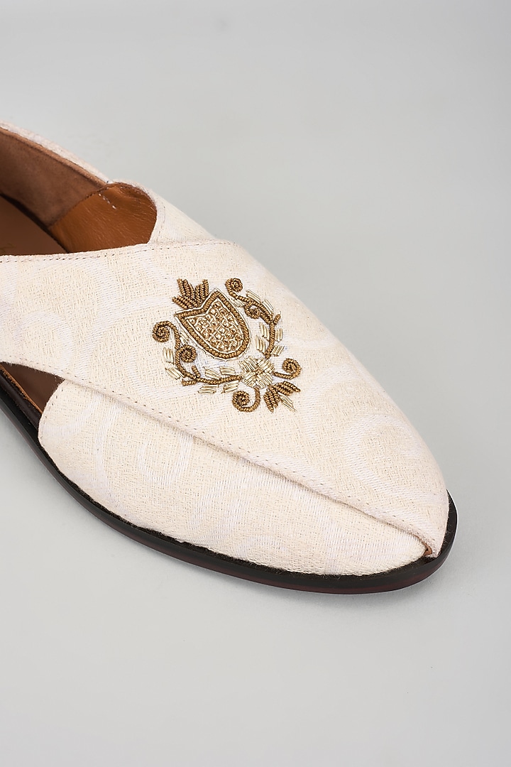 Ivory Jacquard Hand Embroidered Peshawaris by ARTIMEN at Pernia's Pop Up Shop