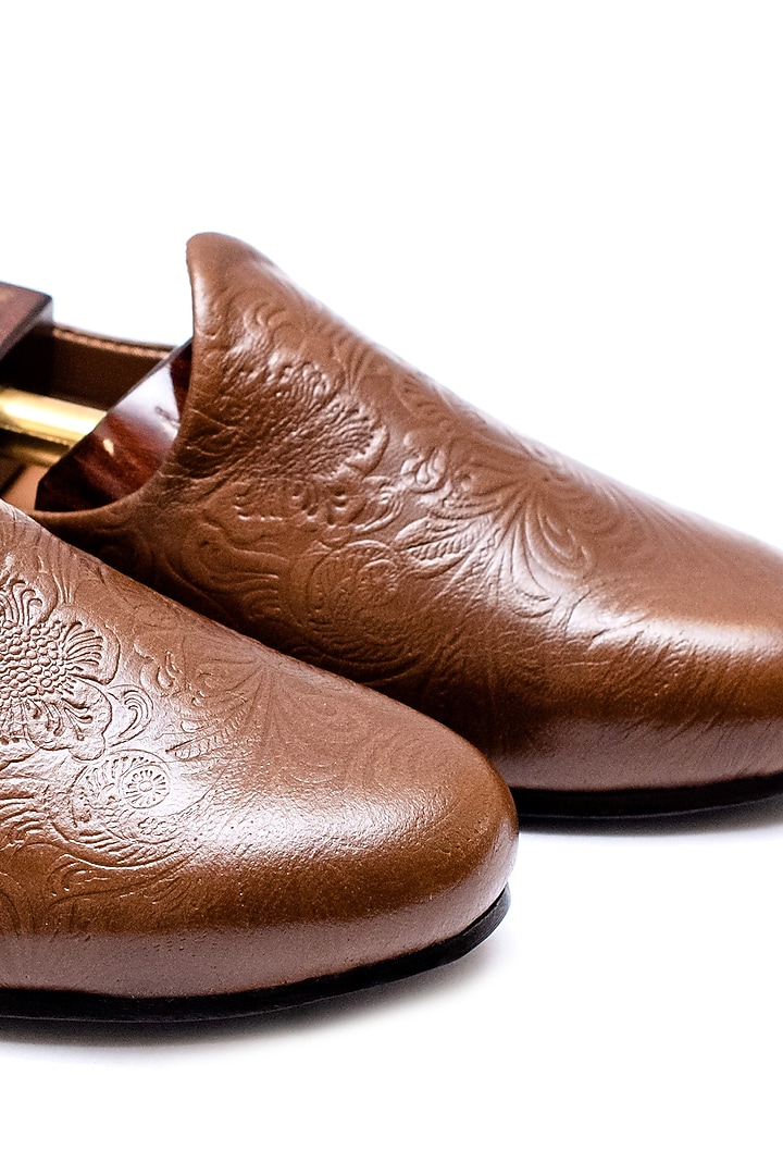 Tan Leather Embossed Juttis by ARTIMEN at Pernia's Pop Up Shop
