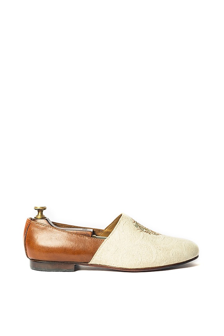 Off-White & Tan Stone Washed Leather Hand Embroidered Juttis by ARTIMEN at Pernia's Pop Up Shop