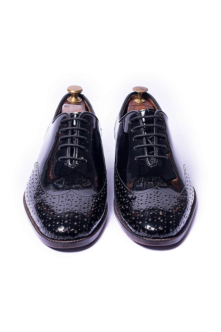 Black Hand Perforated Lace Ups Shoes by ARTIMEN at Pernia's Pop Up Shop