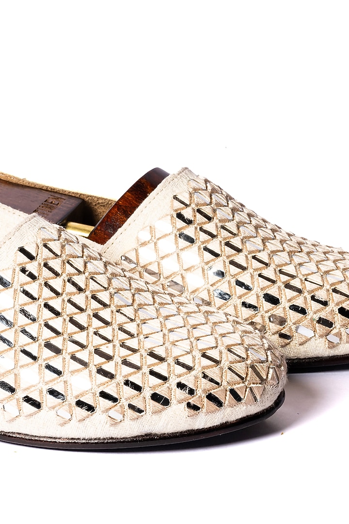 Off-White Leather Mirror Work Juttis by ARTIMEN at Pernia's Pop Up Shop