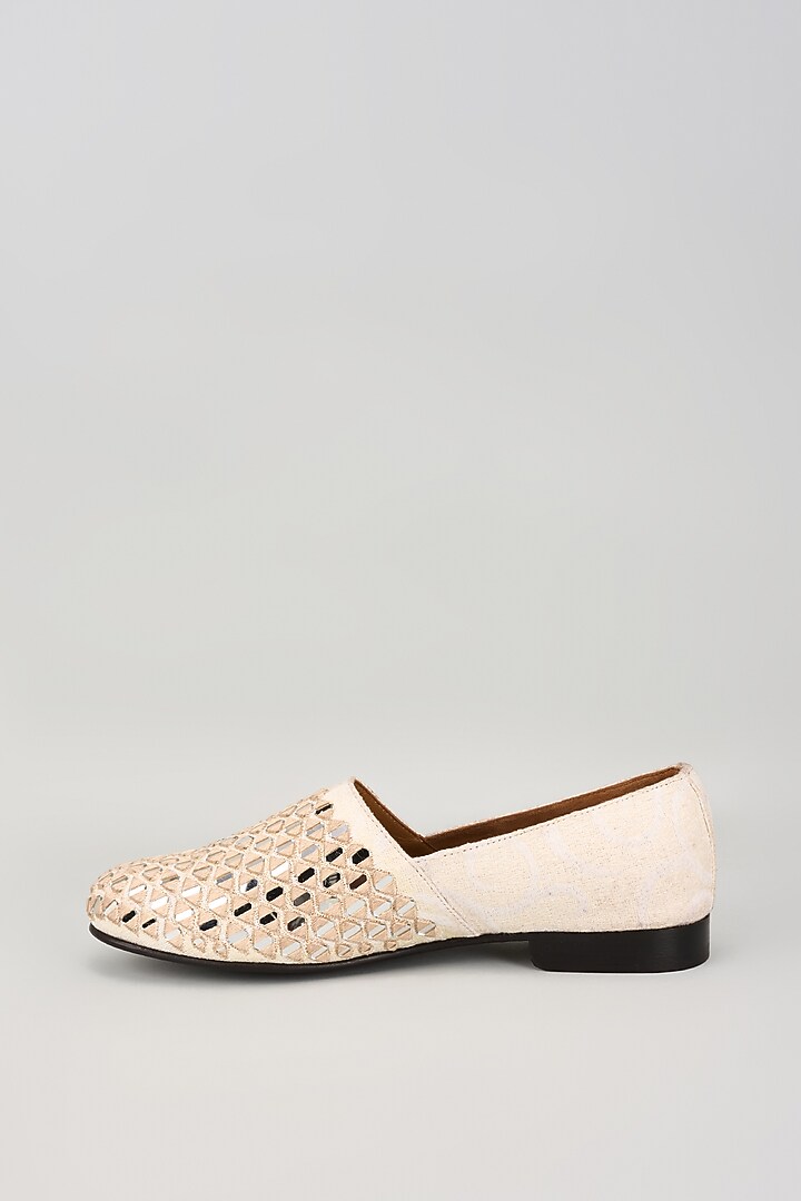 Off-White Fabric Mirror Embellished Juttis by ARTIMEN at Pernia's Pop Up Shop