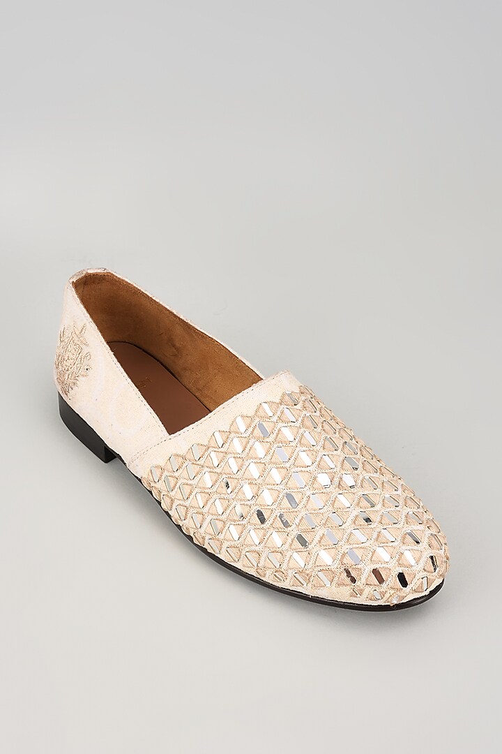 Off-White Fabric Mirror Embellished Juttis by ARTIMEN at Pernia's Pop Up Shop