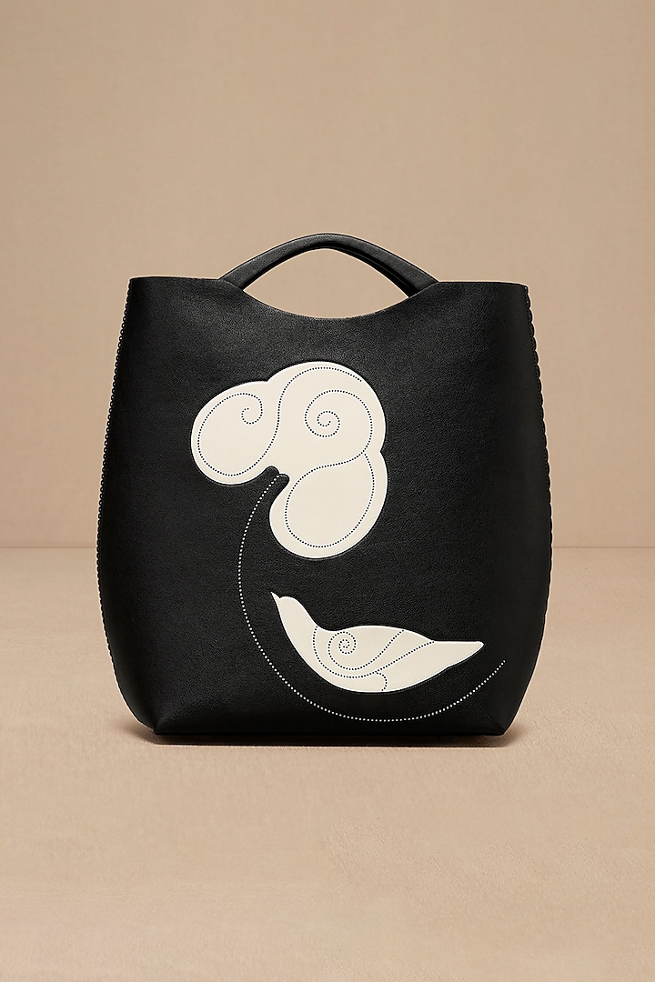 Black Faux Leather Curved Tote Bag by AMPM Accessories at Pernia's Pop Up Shop