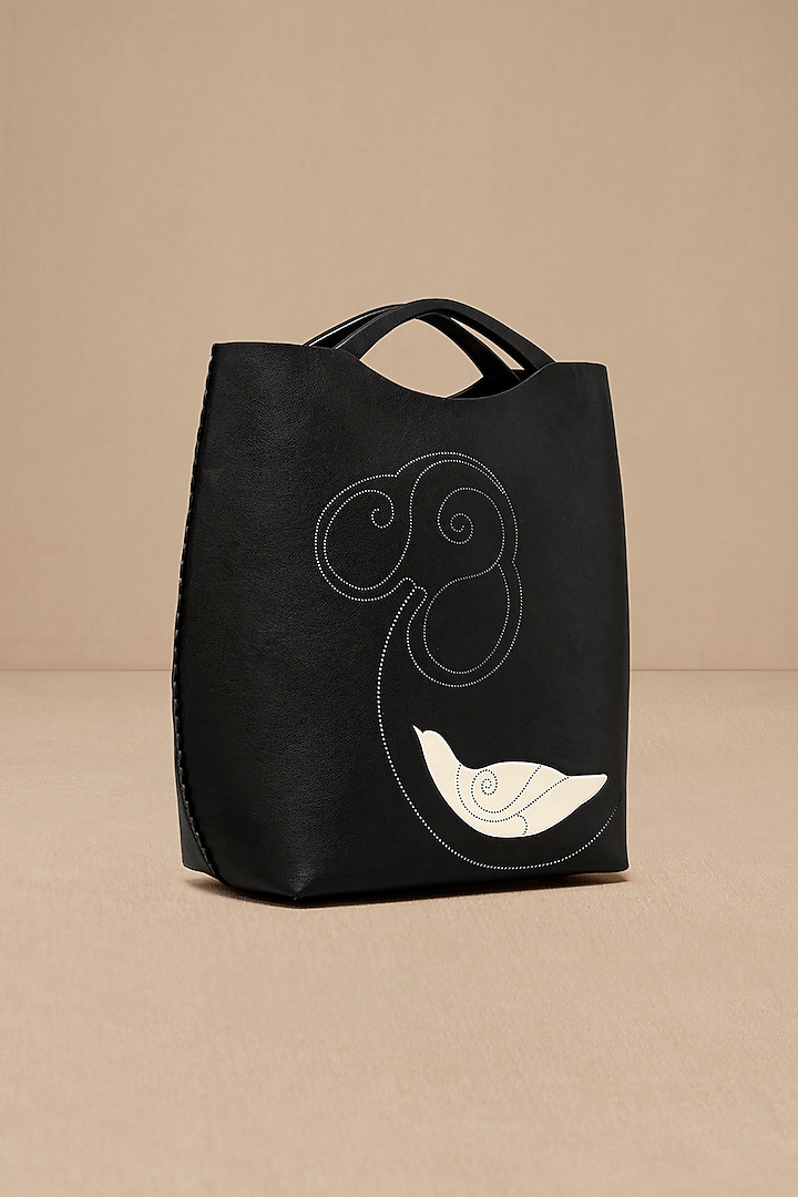 Black Faux Leather Curved Tote Bag by AMPM Accessories at Pernia's Pop Up Shop