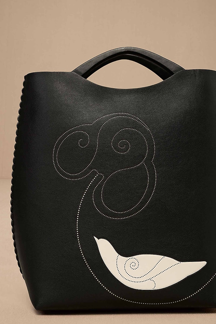 Black Faux Leather Curved Tote Bag by AMPM Accessories at Pernia's Pop Up Shop
