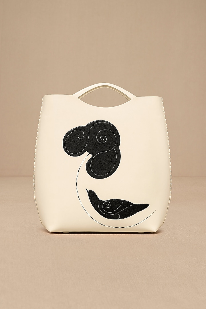 Ivory Faux Leather Curved Tote Bag by AMPM Accessories at Pernia's Pop Up Shop