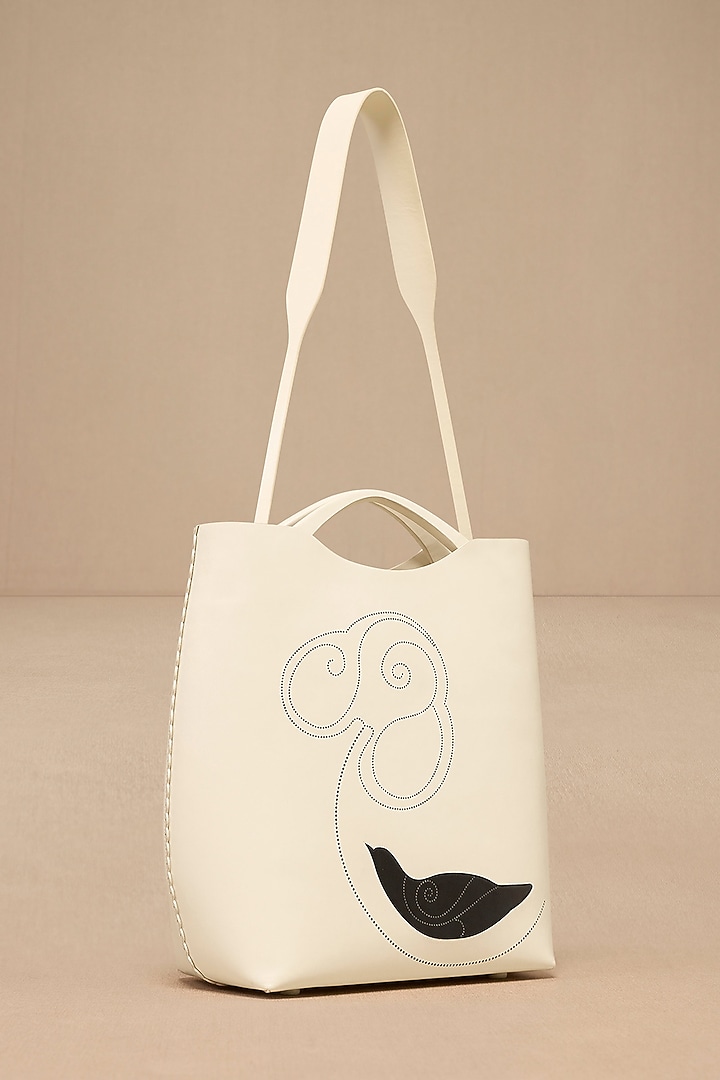 Ivory Faux Leather Curved Tote Bag by AMPM Accessories at Pernia's Pop Up Shop