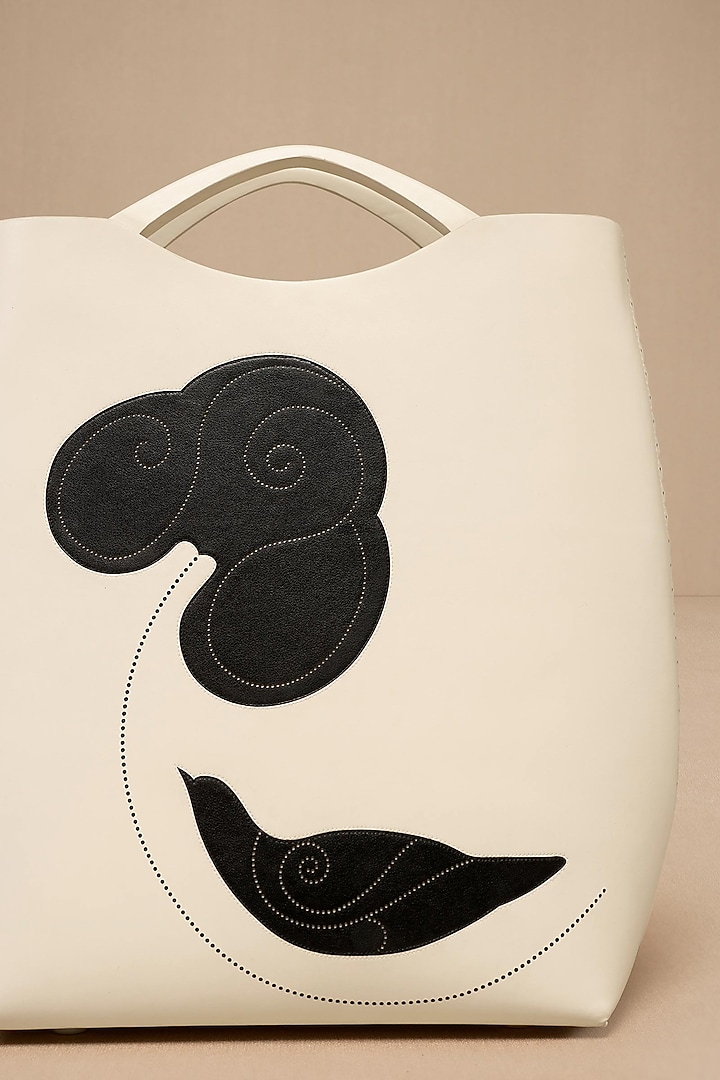 Ivory Faux Leather Curved Tote Bag by AMPM Accessories at Pernia's Pop Up Shop