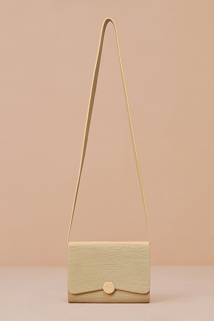 Beige Faux Leather Sling Bag by AMPM Accessories at Pernia's Pop Up Shop