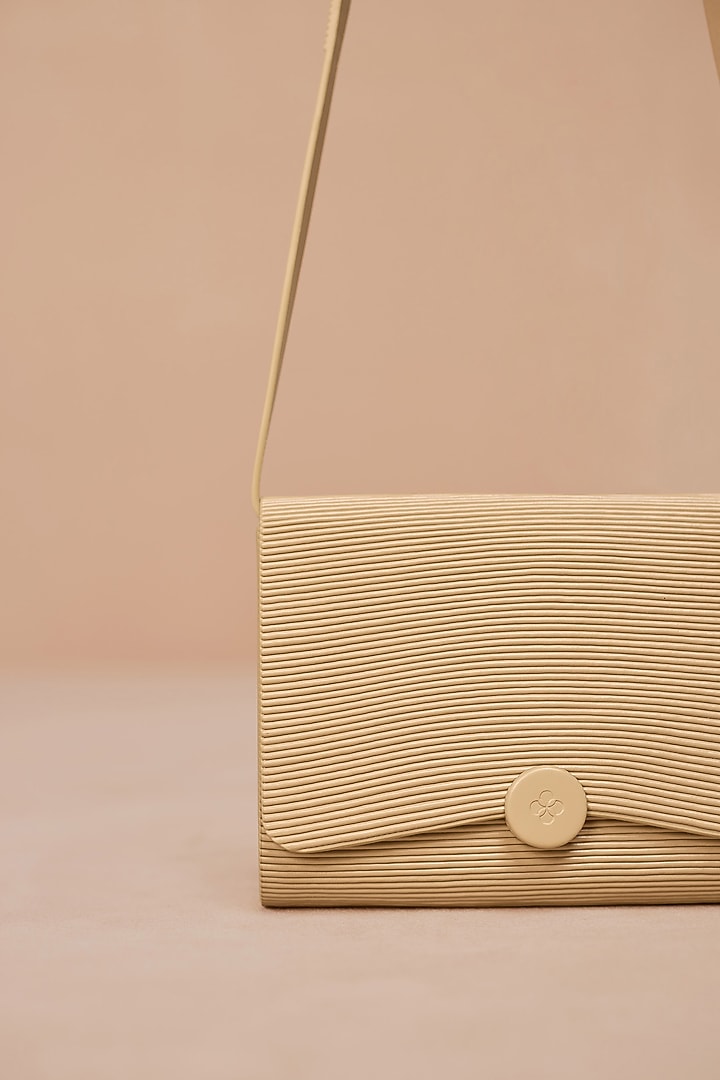 Beige Faux Leather Sling Bag by AMPM Accessories at Pernia's Pop Up Shop