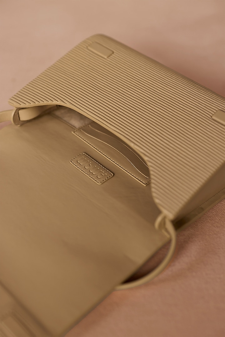 Beige Faux Leather Sling Bag by AMPM Accessories at Pernia's Pop Up Shop