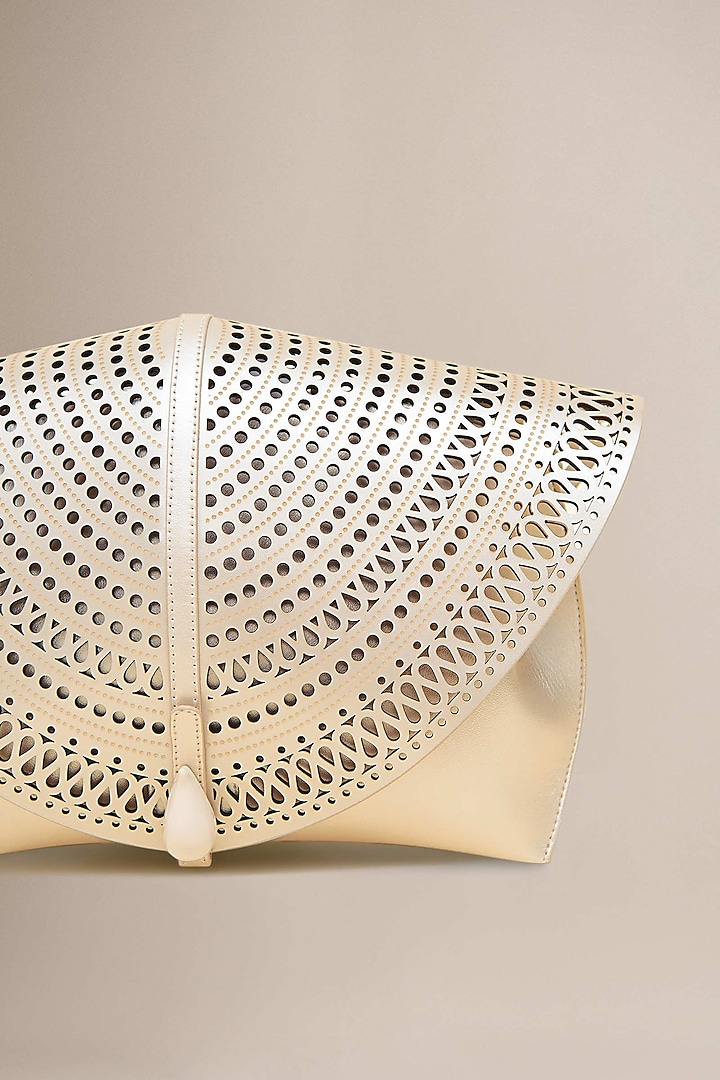 Metallic Pearl White PU & Faux Leather Clutch by AMPM Accessories at Pernia's Pop Up Shop