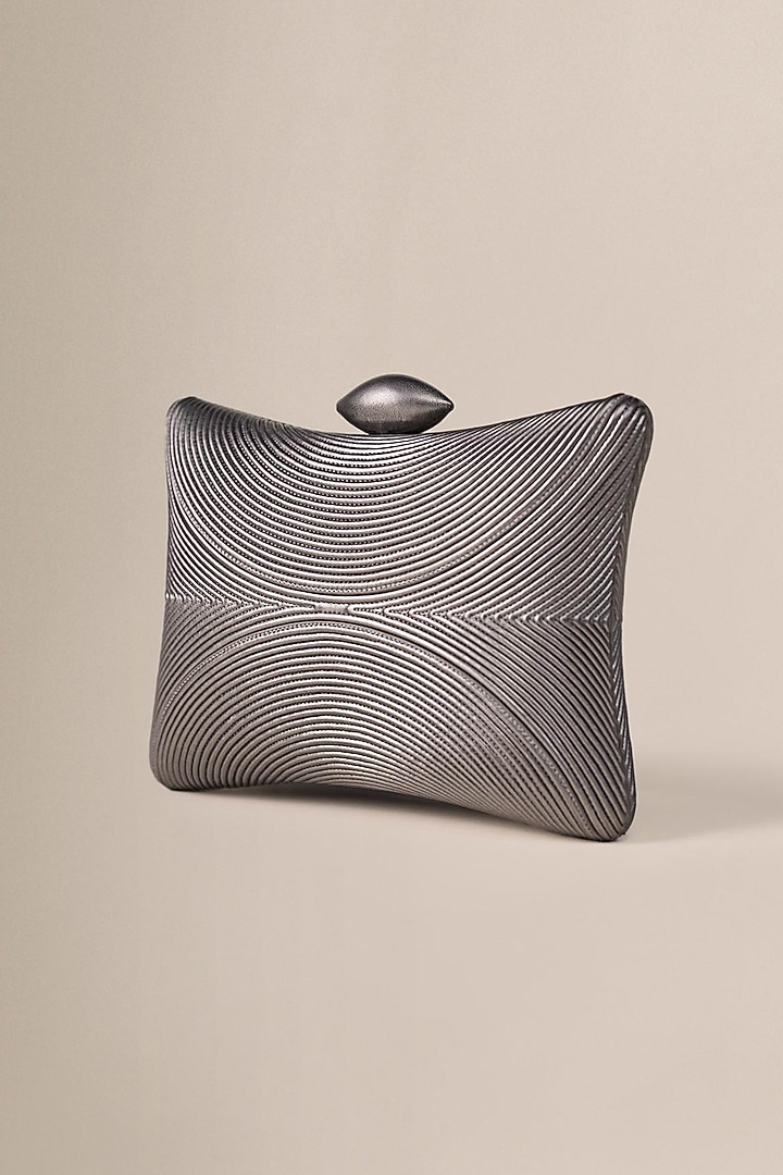 Metallic PU & Faux Leather Embossed Clutch by AMPM Accessories at Pernia's Pop Up Shop