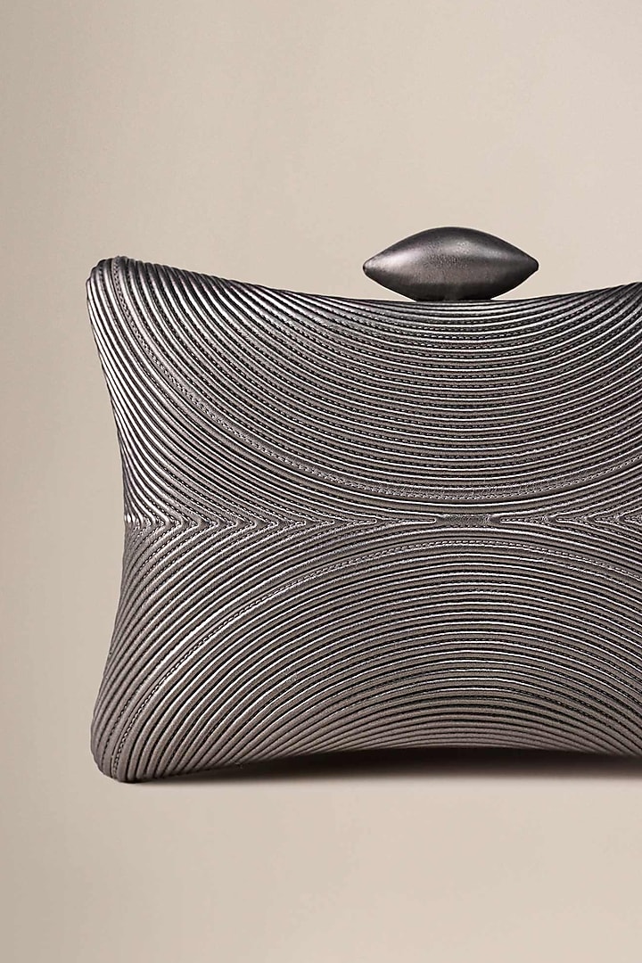 Metallic PU & Faux Leather Embossed Clutch by AMPM Accessories at Pernia's Pop Up Shop