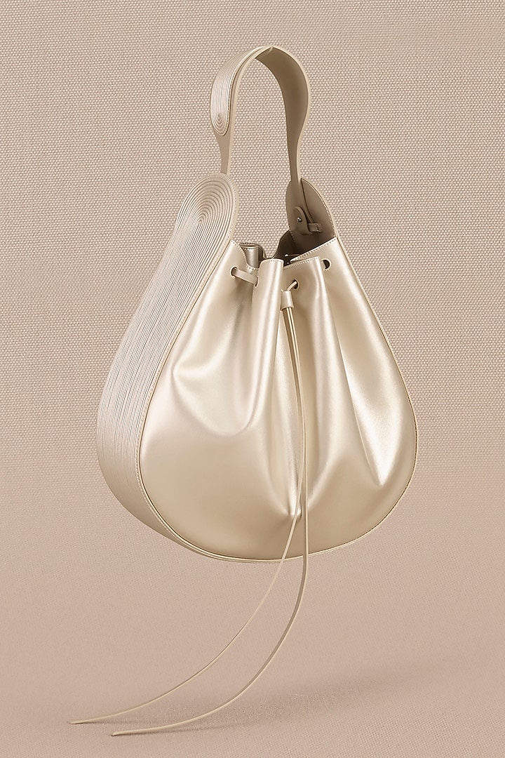 Metallic Pearl Faux Leather Bucket Bag by AMPM Accessories at Pernia's Pop Up Shop