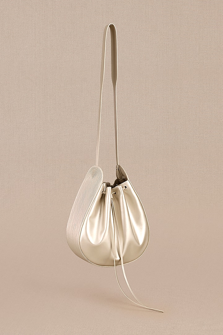 Metallic Pearl Faux Leather Bucket Bag by AMPM Accessories at Pernia's Pop Up Shop