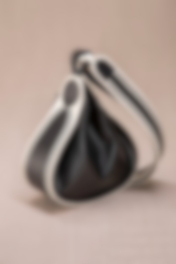 Black & Ivory Faux Leather Cross-Body Bucket Bag by AMPM Accessories at Pernia's Pop Up Shop