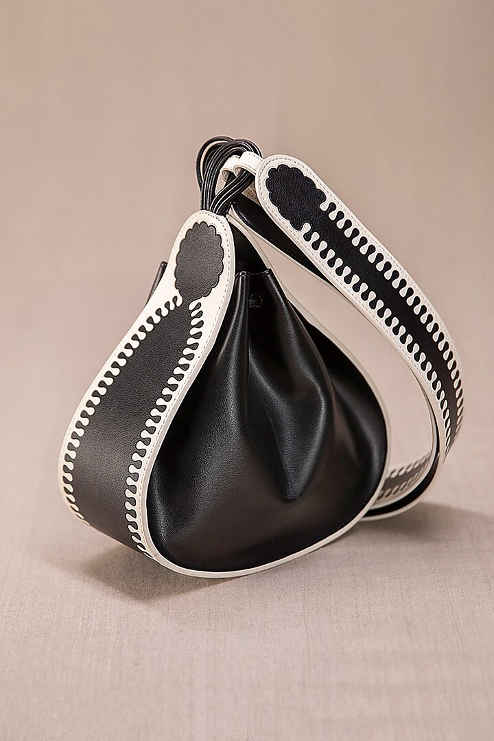 Black & Ivory Faux Leather Cross-Body Bucket Bag by AMPM Accessories at Pernia's Pop Up Shop