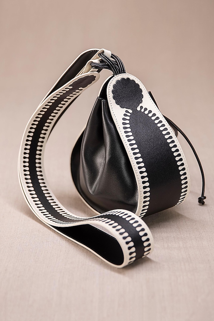 Black & Ivory Faux Leather Cross-Body Bucket Bag by AMPM Accessories at Pernia's Pop Up Shop