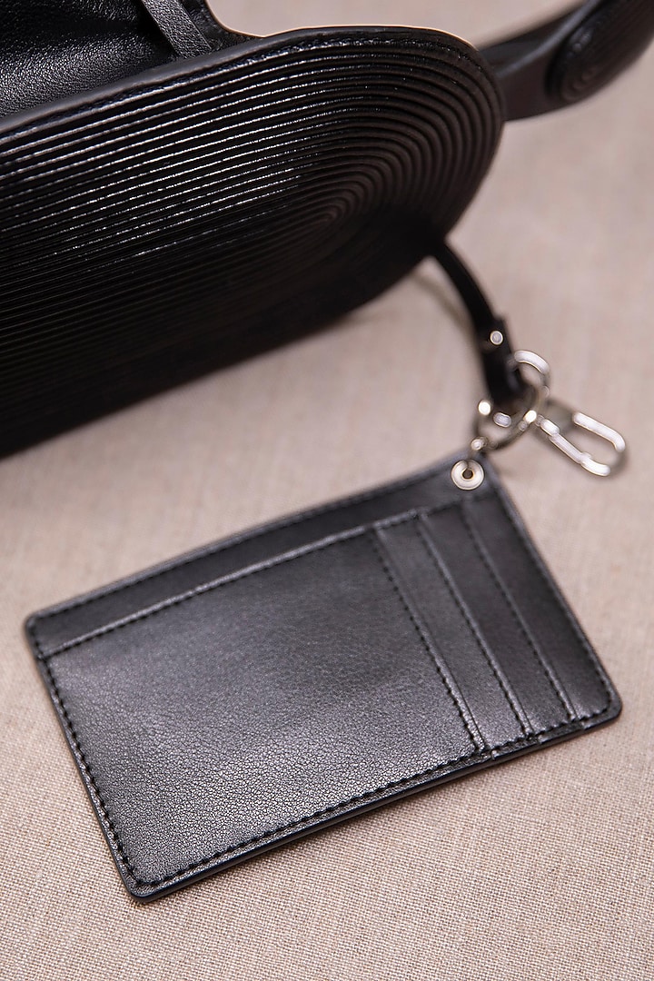 Black Faux Leather Tote Bag by AMPM Accessories at Pernia's Pop Up Shop