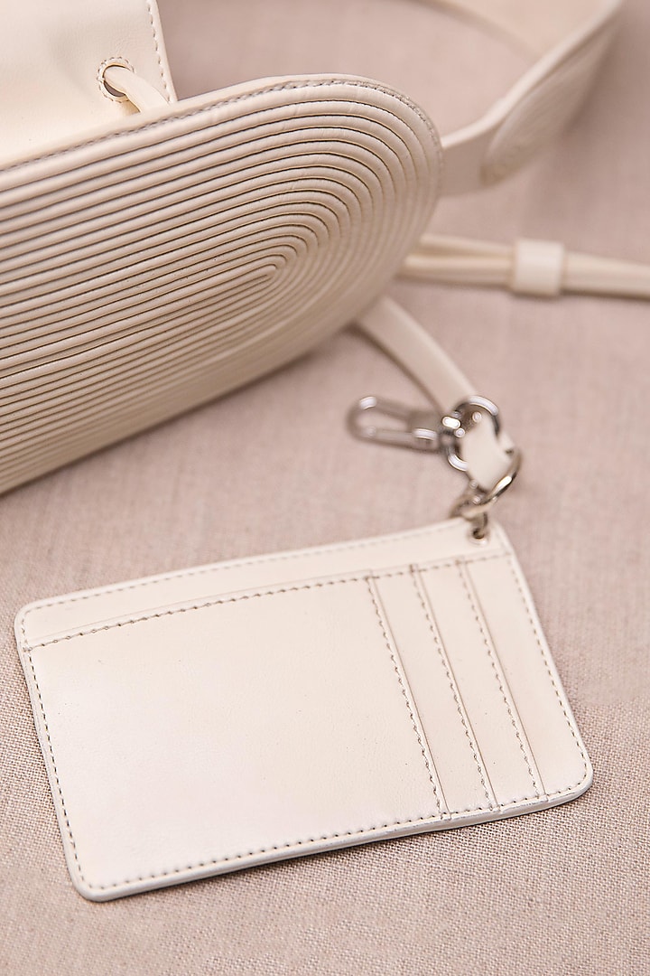 Ivory Faux Leather Tote Bag by AMPM Accessories at Pernia's Pop Up Shop