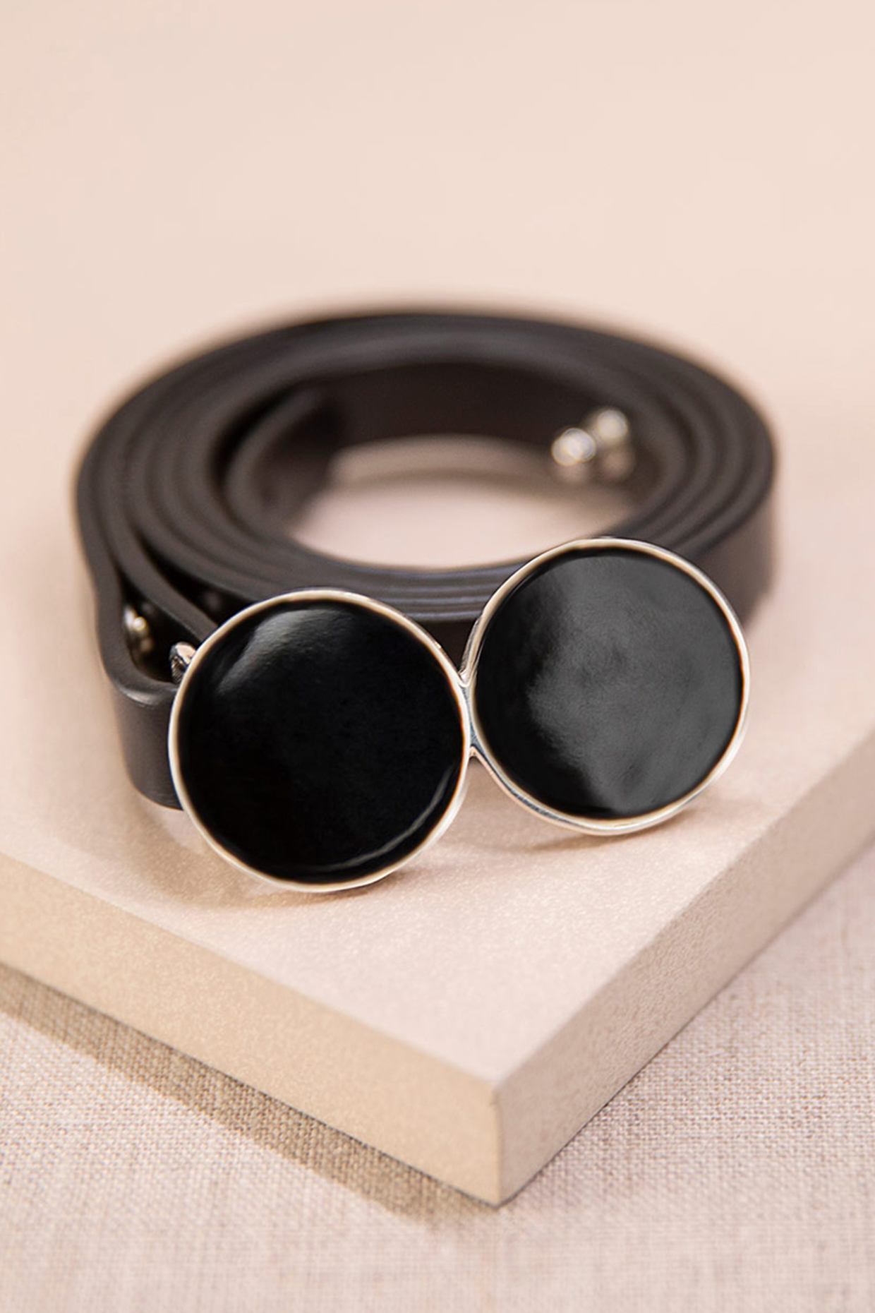 Black Faux Leather Slim Belt by AMPM Accessories