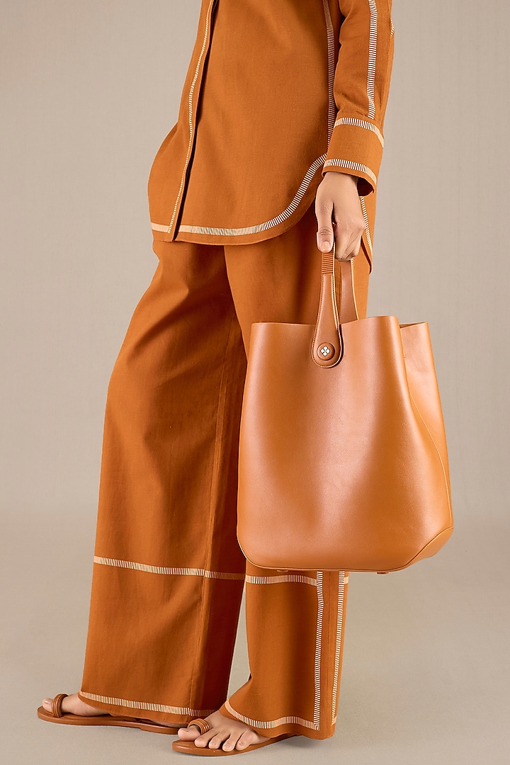 Tan Faux Leather Handbag by AMPM Accessories at Pernia's Pop Up Shop