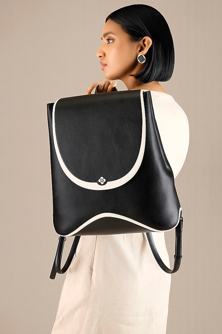 Black Faux Leather Backpack by AMPM Accessories at Pernia's Pop Up Shop