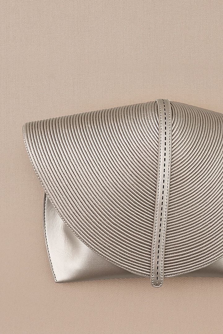 Silver Faux Leather Clutch by AMPM Accessories at Pernia's Pop Up Shop