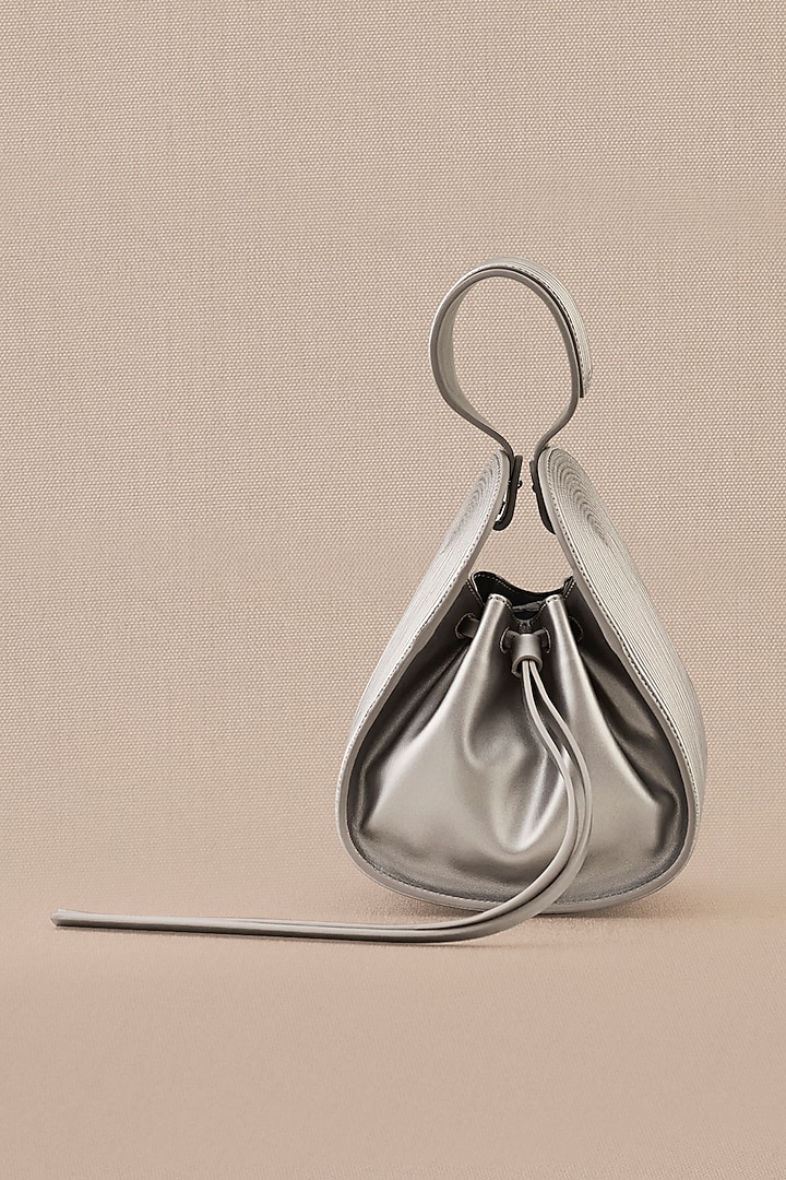 Silver Faux Leather Bucket Bag by AMPM Accessories at Pernia's Pop Up Shop
