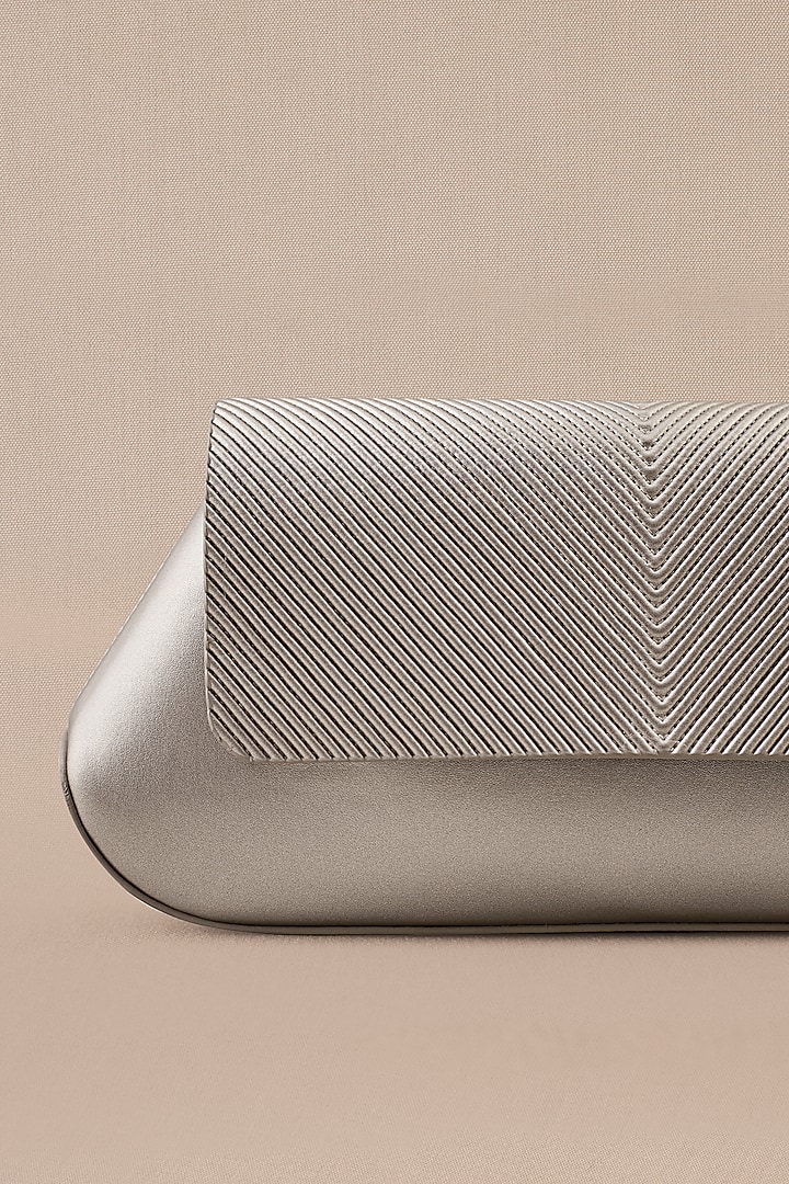 Silver Faux Leather Clutch by AMPM Accessories at Pernia's Pop Up Shop