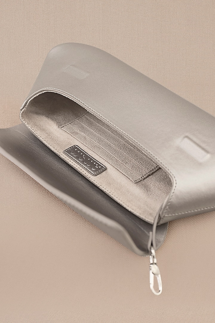 Silver Faux Leather Clutch by AMPM Accessories at Pernia's Pop Up Shop
