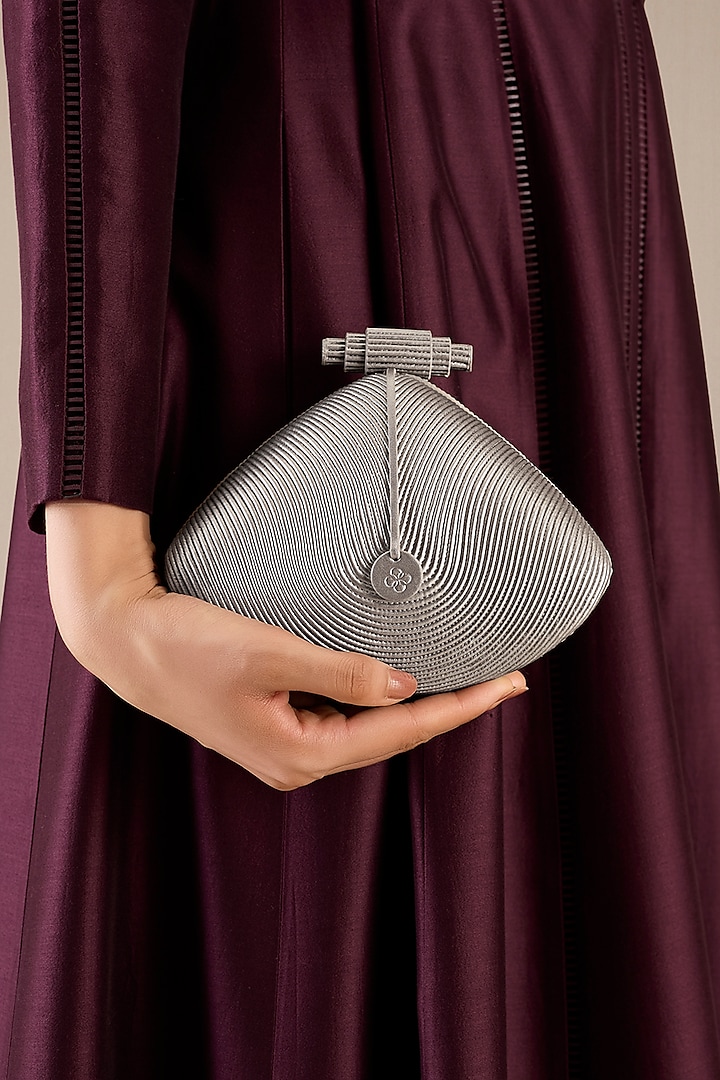 Silver Faux Leather Metallic Clutch by AMPM Accessories at Pernia's Pop Up Shop