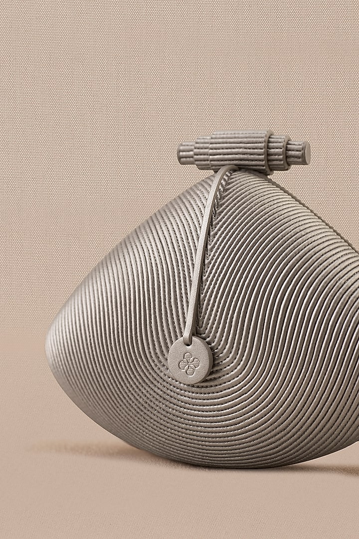 Silver Faux Leather Metallic Clutch by AMPM Accessories at Pernia's Pop Up Shop