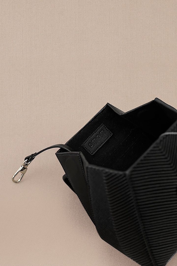 Black Faux Leather Wristlet Bag by AMPM Accessories at Pernia's Pop Up Shop
