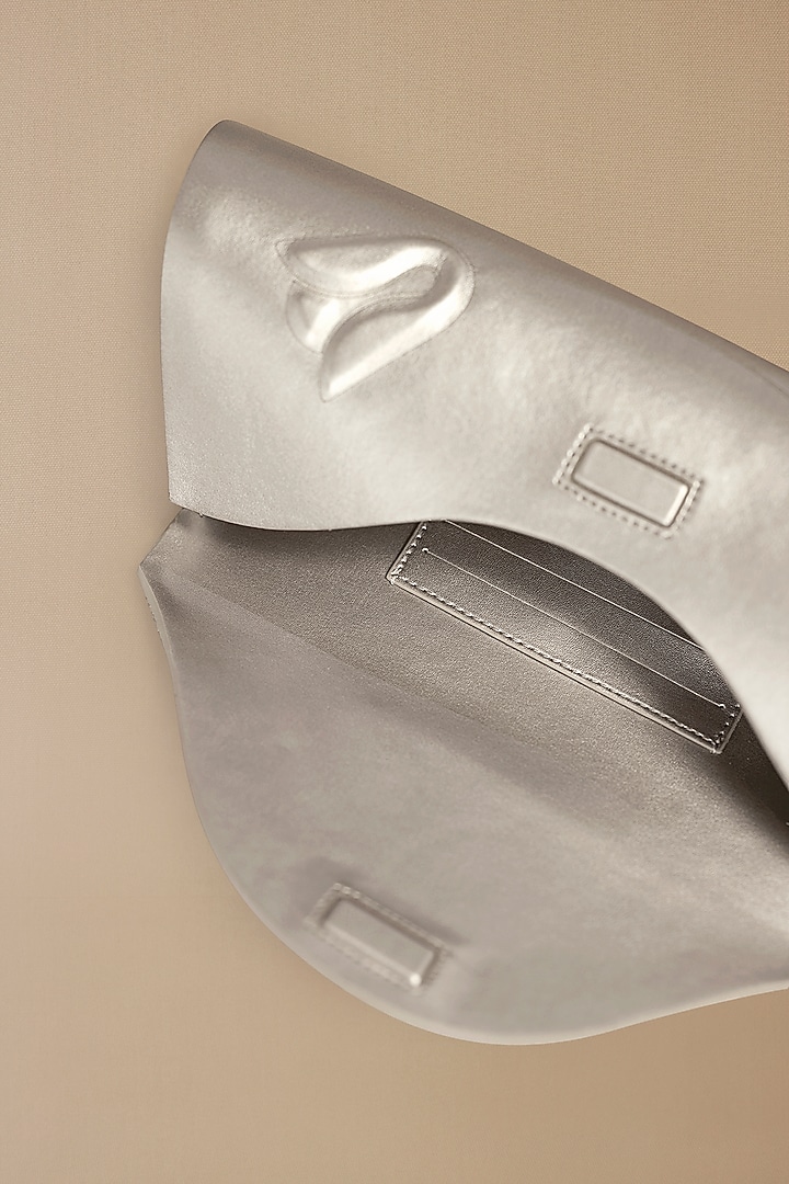 Silver Faux Leather Clutch by AMPM Accessories at Pernia's Pop Up Shop